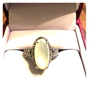 Stamped sterling silver ring.Mother of pearl stone